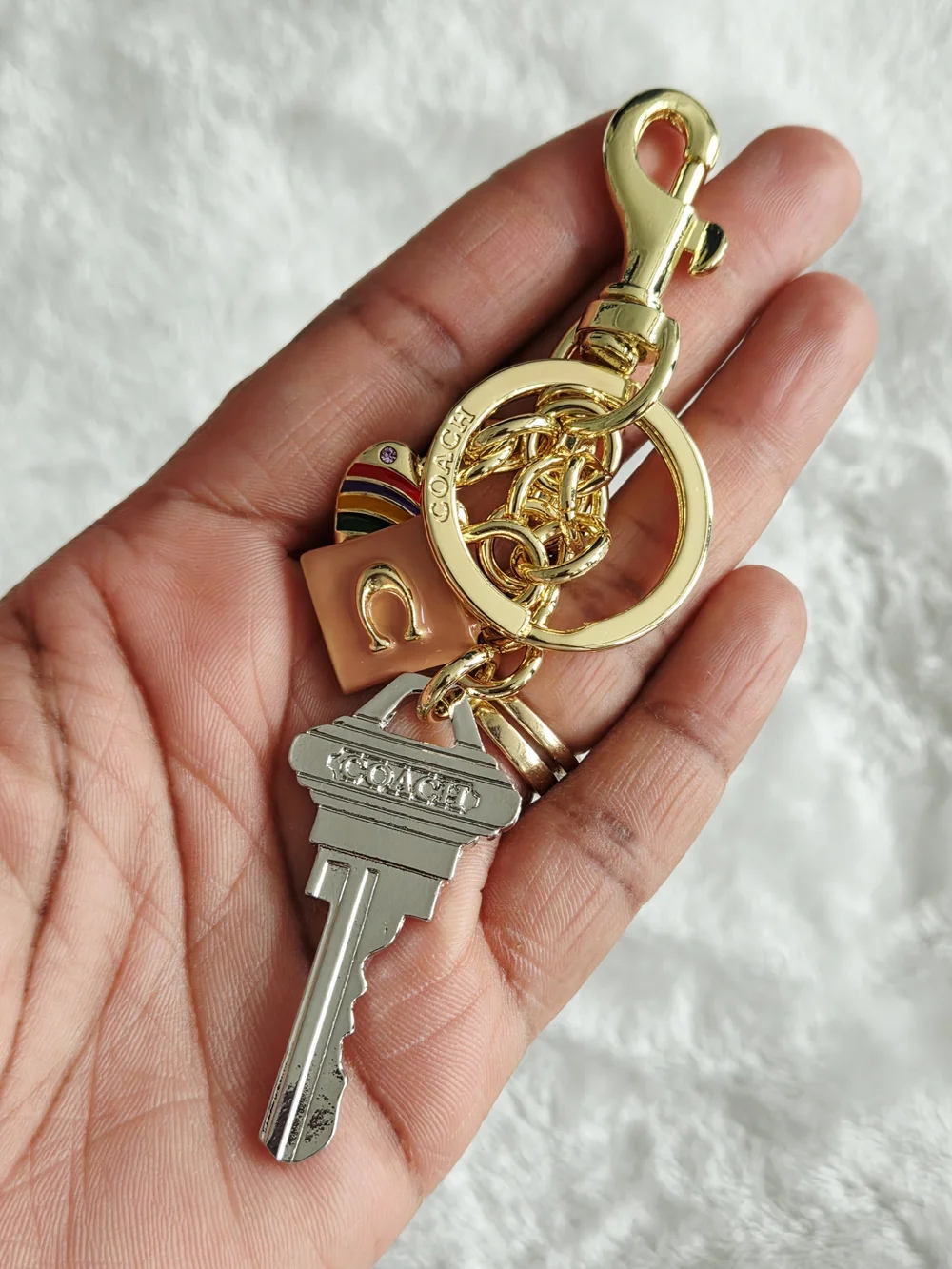 C Logo Gold-Tone Silver Key Keychain with Rainbow Heart and Pink Lock Accent
